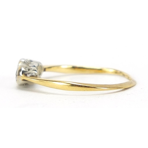 1030 - 18ct gold and platinum diamond three stone ring, size I, 1.1g