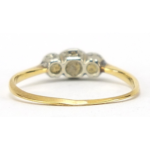 1030 - 18ct gold and platinum diamond three stone ring, size I, 1.1g