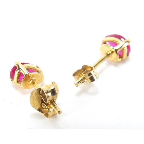 945 - Pair of silver gilt ruby tear drop stud earrings, 6.0mm high, 0.5g