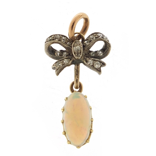 15 - Antique unmarked gold cabochon opal and diamond pendant, 2.5cm high, 2.0g