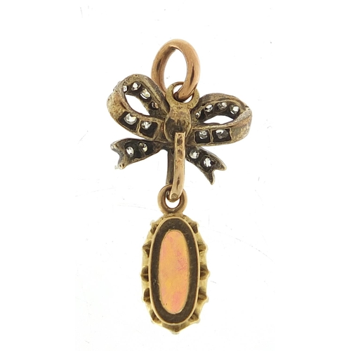15 - Antique unmarked gold cabochon opal and diamond pendant, 2.5cm high, 2.0g