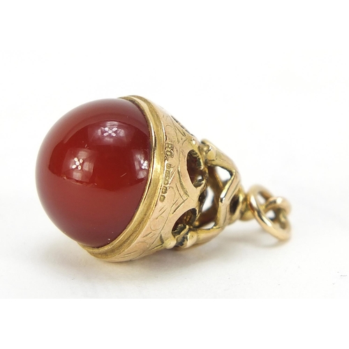 1059 - 9ct gold carnelian orb pendant, 2.5cm high, 7.7g