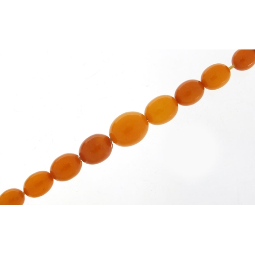 58 - Butterscotch amber coloured graduated bead necklace, 44cm in length, 23.2g