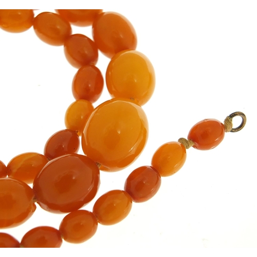 58 - Butterscotch amber coloured graduated bead necklace, 44cm in length, 23.2g