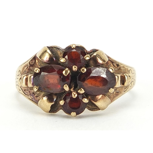 849 - 9ct gold garnet cluster ring, size O, 2.5g