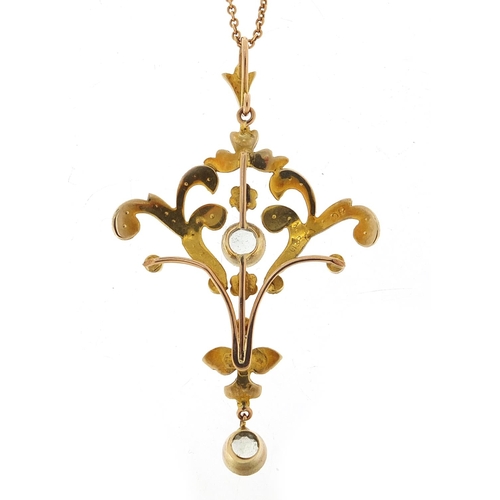 94 - Art Nouveau 9ct gold aquamarine and seed pearl pendant on a 9ct gold necklace, housed in a Bowden & ... 