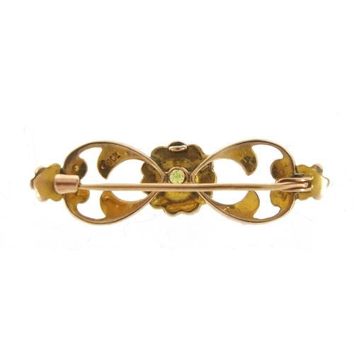 743 - 9ct gold peridot and seed pearl bar brooch, housed in a Gieve Matthews & Seagrove Ltd tooled leather... 