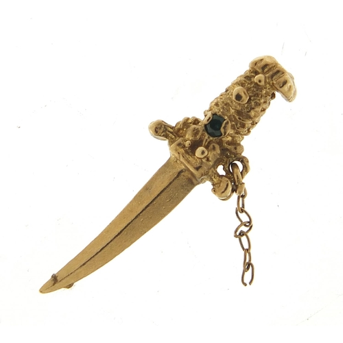 311 - 9ct gold dagger pendant set with blue and green stones, 2.6cm in length, 1.5g