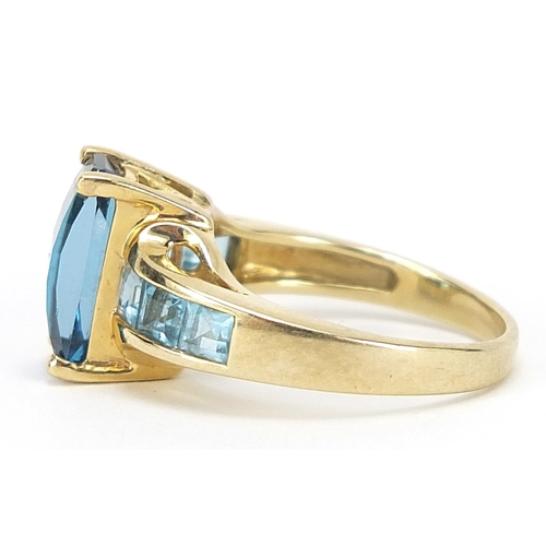 882 - 9ct gold blue stone ring, size N, 4.7g