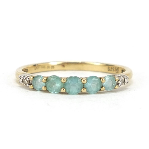 504 - 9ct gold blue zircon and diamond half eternity ring, size L, 1.2g