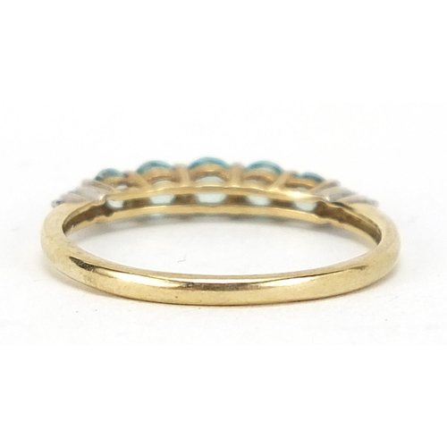 504 - 9ct gold blue zircon and diamond half eternity ring, size L, 1.2g