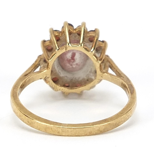 1025 - 9ct gold garnet cluster ring, size M, 3.2g