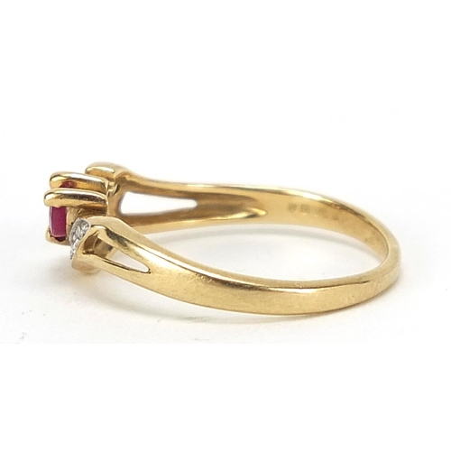 915 - 9ct gold ruby and diamond crossover ring, size K/L, 1.5g