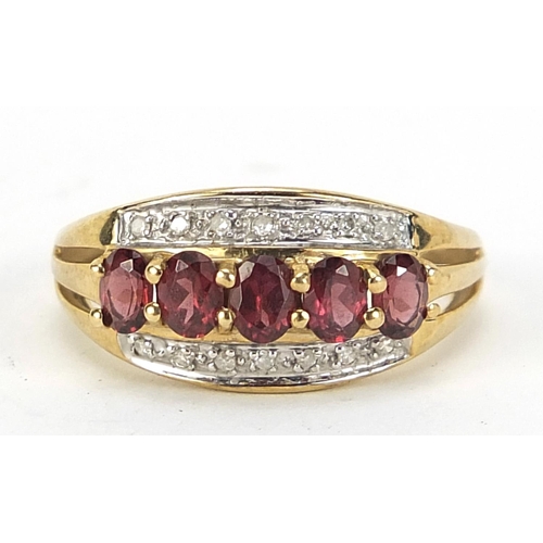 422 - 9ct gold ruby and diamond ring, size O, 2.4g