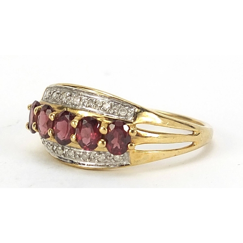 422 - 9ct gold ruby and diamond ring, size O, 2.4g