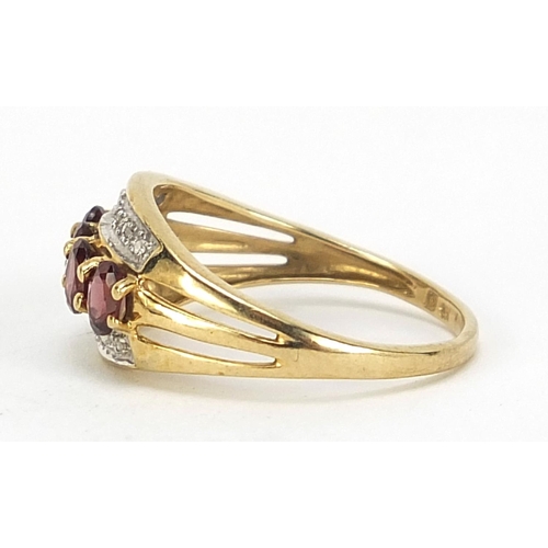 422 - 9ct gold ruby and diamond ring, size O, 2.4g