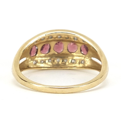 422 - 9ct gold ruby and diamond ring, size O, 2.4g