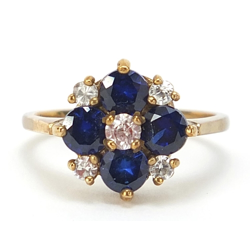 1076 - 9ct gold blue and white stone cluster ring, size J, 2.5g