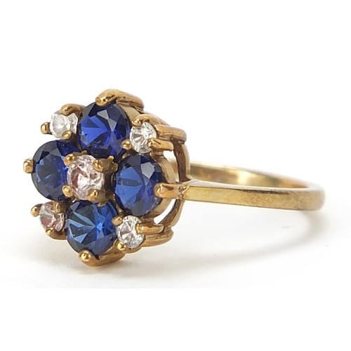 1076 - 9ct gold blue and white stone cluster ring, size J, 2.5g