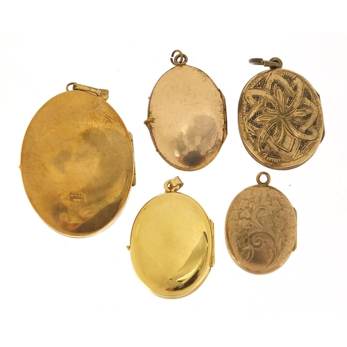 312 - Five 9ct gold front and back and rolled gold lockets, the largest 5cm high, total 36.0g