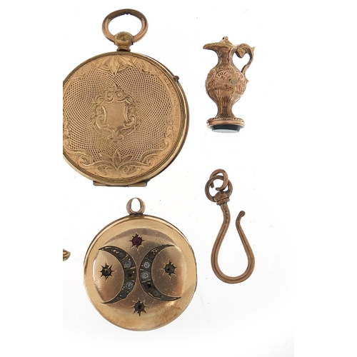 697 - Victorian and later gilt metal jewellery including lockets, bar brooch, earrings and charm, the larg... 