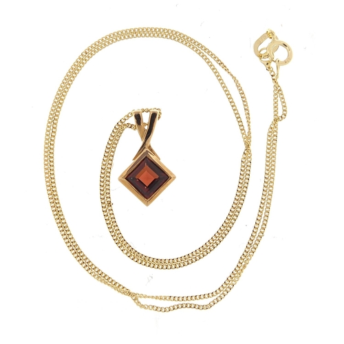 914 - 9ct gold garnet pendant on a 9ct gold necklace, 1.5cm high and 40cm in length, total 1.7g