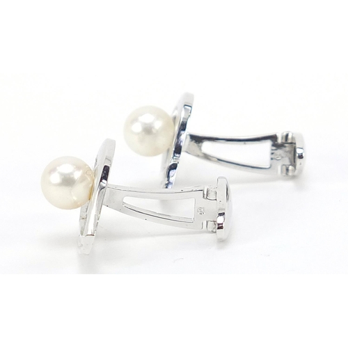 496 - Pair of silver Mikimoto pearl cufflinks, 2.6cm in length 8.8g