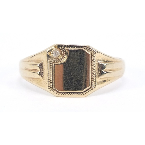 659 - 9ct gold signet ring set with a diamond, size K, 1.3g