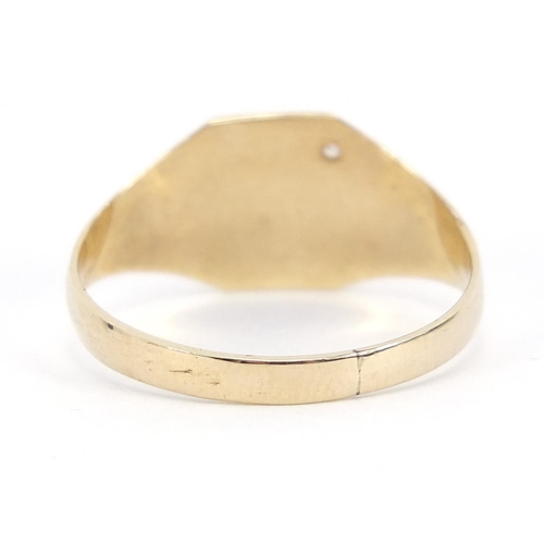 659 - 9ct gold signet ring set with a diamond, size K, 1.3g