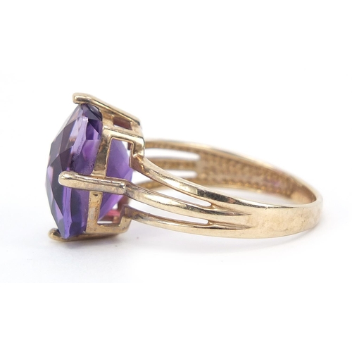 209 - 9ct gold facetted amethyst ring, size R, 4.2g