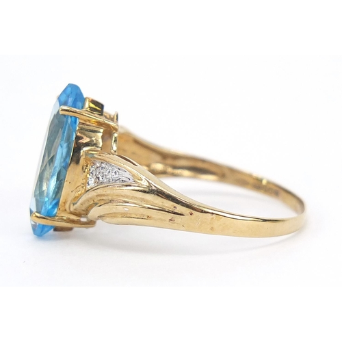 889 - 9ct gold marquis blue topaz and diamond ring, size S, 2.7g