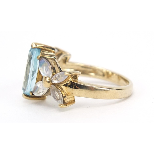 1027 - 9ct gold blue and clear stone ring, size N, 4.2g