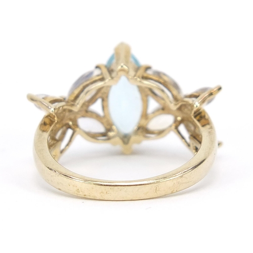 1027 - 9ct gold blue and clear stone ring, size N, 4.2g