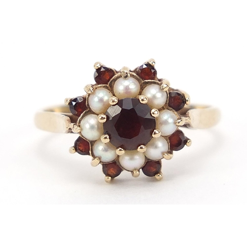 770 - 9ct gold garnet and cultured pearl ring, size N, 2.2g