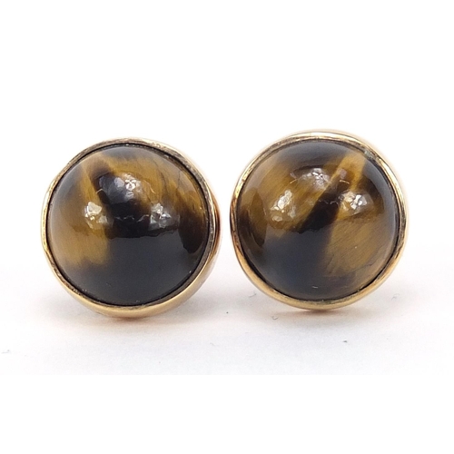 577 - Pair of 9ct gold cabochon tiger's eye stud earrings, 1.1cm in diameter