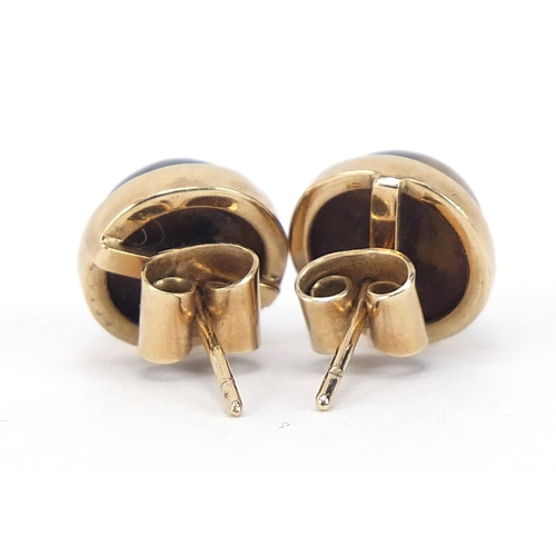 577 - Pair of 9ct gold cabochon tiger's eye stud earrings, 1.1cm in diameter