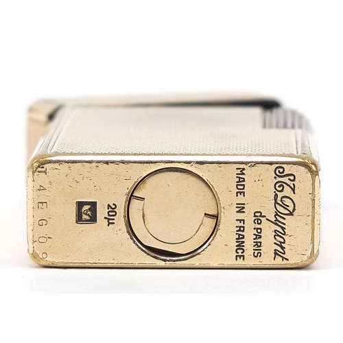 752 - S J Dupont, gold plated pocket lighter with engine turned decoration with box and paperwork, 6cm hig... 