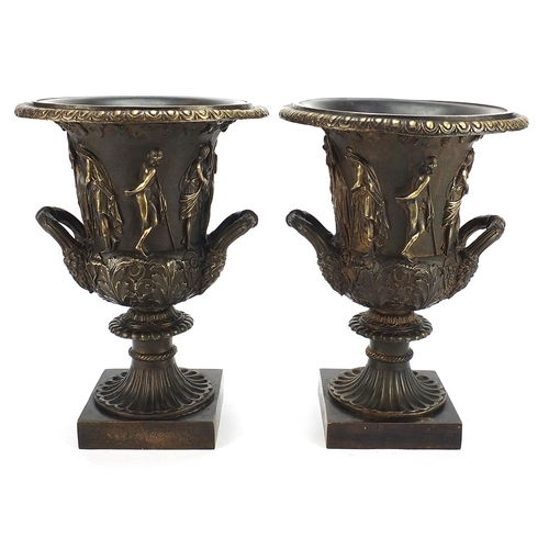 603 - Large pair of patinated bronze campana urn vases with twin handles decorated with maidens, each 32cm... 