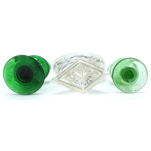 902 - Two Georgian green glass eye baths and a cut glass salt, the largest 8cm high