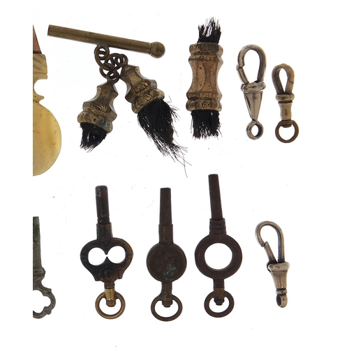 782 - Collection of antique and later watch keys, fobs and T bars including some silver and a gold coloure... 