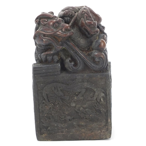 731 - Large Chinese bronze dragon seal, character marks to the base, 13cm high