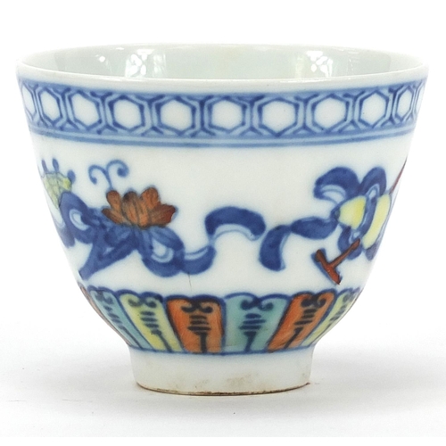 823 - Chinese doucai porcelain tea bowl hand painted with Daoist emblems, six figure character marks to th... 