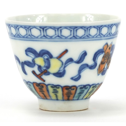 823 - Chinese doucai porcelain tea bowl hand painted with Daoist emblems, six figure character marks to th... 