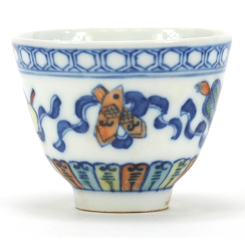 823 - Chinese doucai porcelain tea bowl hand painted with Daoist emblems, six figure character marks to th... 