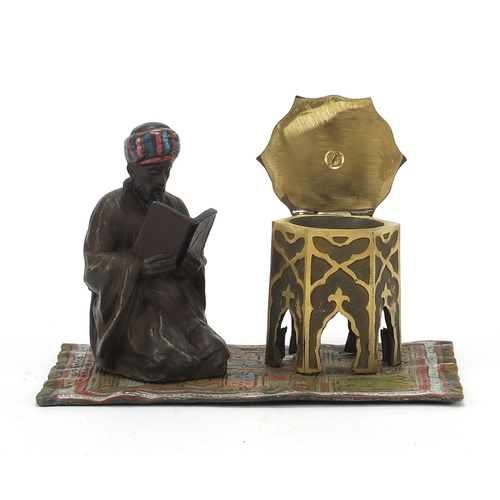 793 - Cold painted bronze figure of an Arab on carpet in the style of Franz Xaver Bergmann, 14cm wide