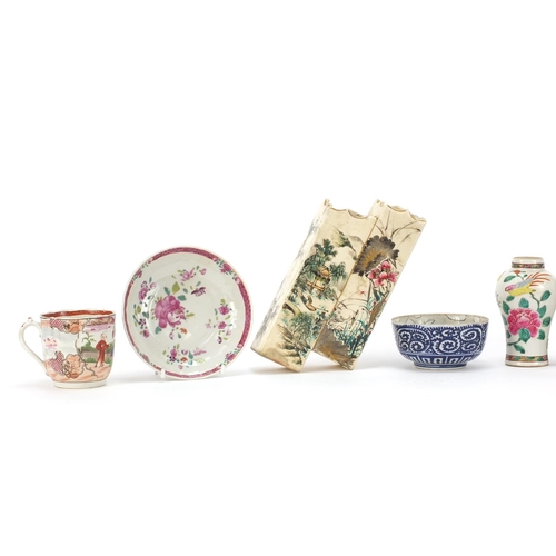 928 - Chinese and Japanese ceramics including a cup and saucer hand painted in the famille rose palette an... 