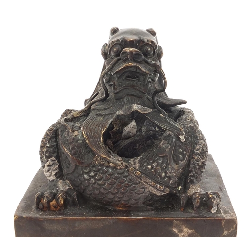 472 - Very large Chinese patinated bronze dragon seal, character marks to the underside, 16cm high