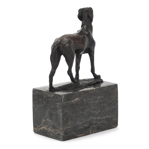 1042 - Patinated bronze greyhound raised on a rectangular block marble base, 19cm high