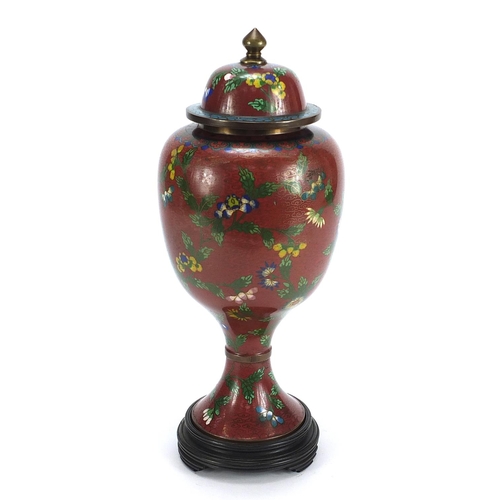 564 - Chinese cloisonné pedestal vase and cover enamelled with flowers, 35cm high