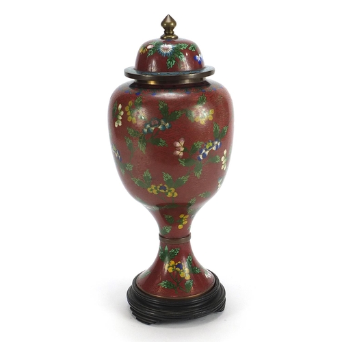 564 - Chinese cloisonné pedestal vase and cover enamelled with flowers, 35cm high